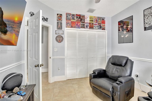 4060 SW 152nd Ave, Miramar, FL 33027 - living area featuring visible vents, a textured ceiling, and light tile patterned flooring