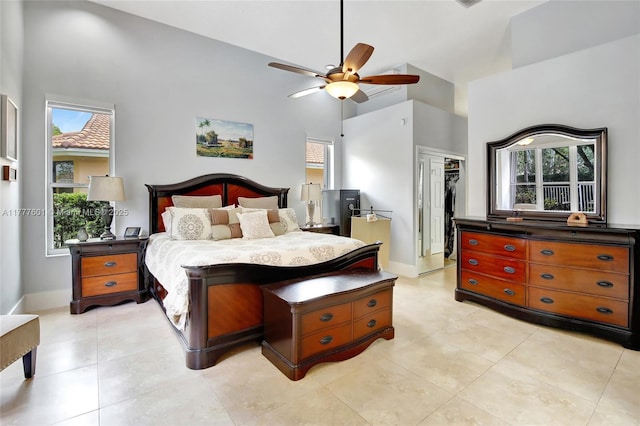 4060 SW 152nd Ave, Miramar, FL 33027 - bedroom with high vaulted ceiling, baseboards, and multiple windows