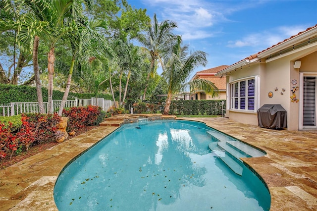 4060 SW 152nd Ave, Miramar, FL 33027 - view of pool featuring a fenced backyard, a grill, a fenced in pool, and a patio