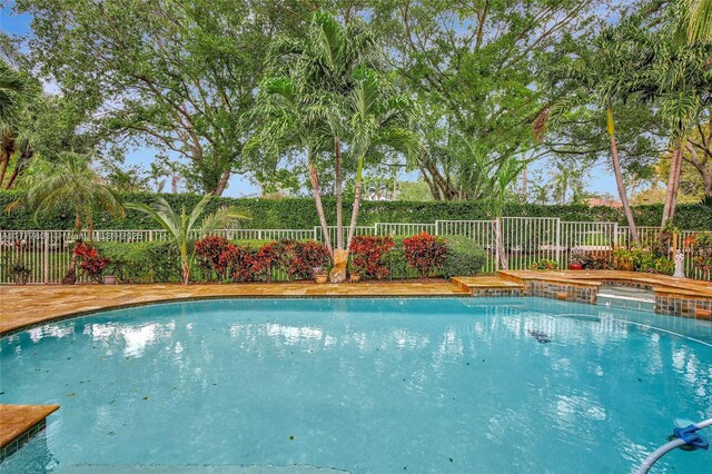 4060 SW 152nd Ave, Miramar, FL 33027 - view of swimming pool with a fenced backyard and a fenced in pool