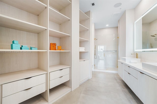 2001 Meridian Ave Unit 514, Miami Beach, FL 33139 - interior space with a shower stall, double vanity, a sink, and visible vents