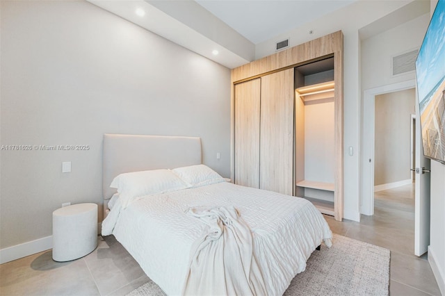 2001 Meridian Ave Unit 514, Miami Beach, FL 33139 - bedroom with visible vents, baseboards, recessed lighting, and a closet
