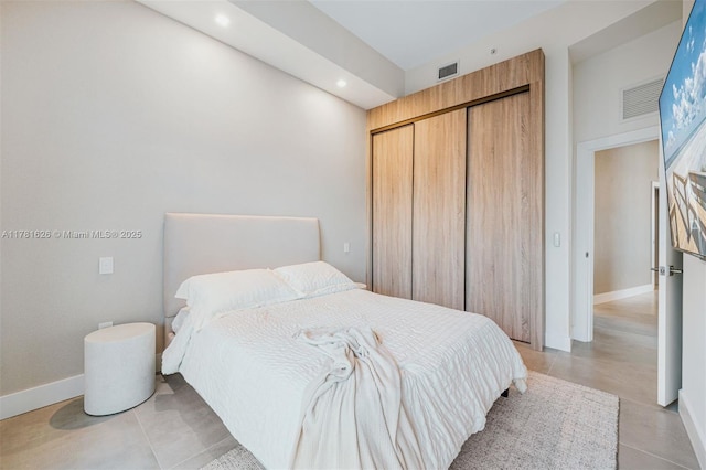 2001 Meridian Ave Unit 514, Miami Beach, FL 33139 - bedroom with recessed lighting, visible vents, a closet, and baseboards
