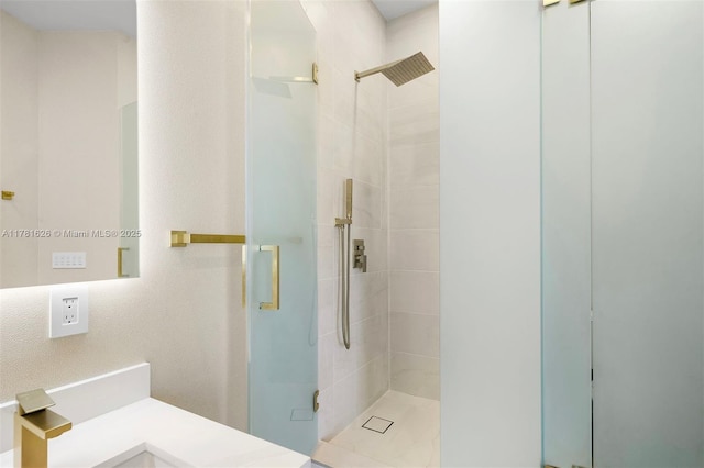 2001 Meridian Ave Unit 514, Miami Beach, FL 33139 - bathroom with a shower stall and vanity