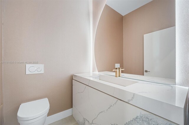 2001 Meridian Ave Unit 514, Miami Beach, FL 33139 - bathroom featuring toilet and vanity