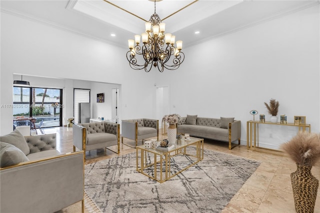 living area featuring a notable chandelier, a high ceiling, ornamental molding, a tray ceiling, and recessed lighting