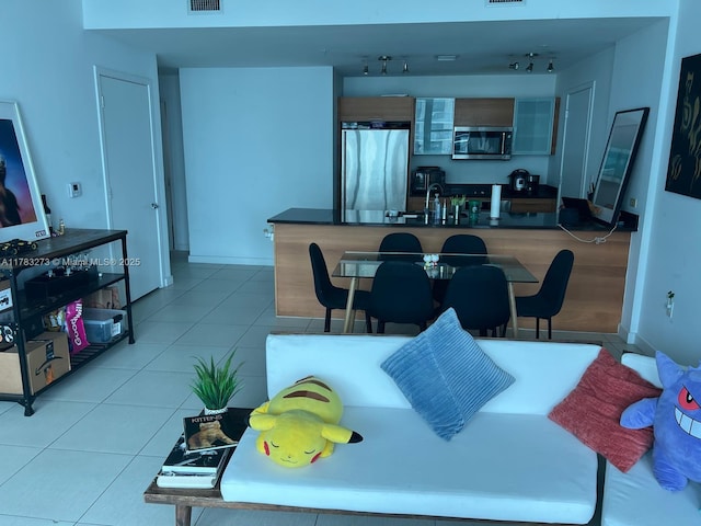 3301 NE 1st Ave Unit H1810, Miami, FL 33137 - tiled dining space with baseboards