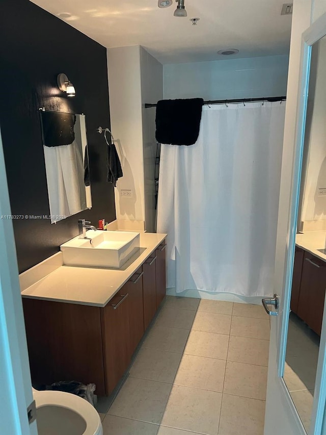 3301 NE 1st Ave Unit H1810, Miami, FL 33137 - bathroom with vanity, tile patterned floors, and a shower with curtain