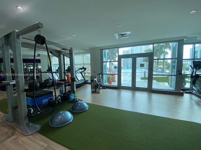 3301 NE 1st Ave Unit H1810, Miami, FL 33137 - exercise room featuring wood finished floors