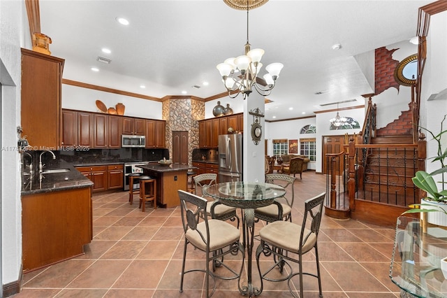 dining room with stairway, visible vents, an inviting chandelier, and crown molding