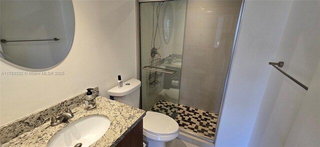 2801 NE 183rd St Unit 714W, Aventura, FL 33160 - full bathroom featuring a stall shower, toilet, and vanity