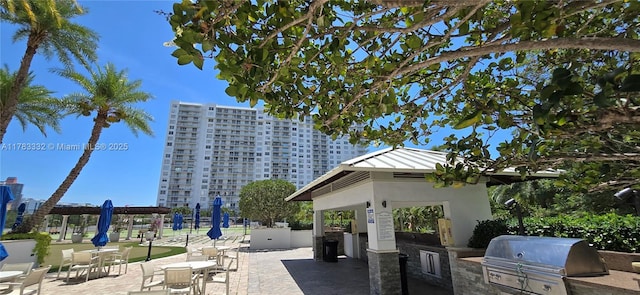 2801 NE 183rd St Unit 714W, Aventura, FL 33160 - surrounding community with exterior kitchen, a gazebo, and a patio area