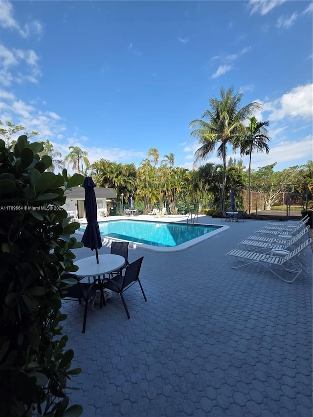 community pool featuring a patio