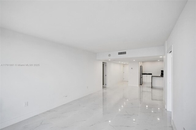 3625 N Country Club Dr Unit 2310, Aventura, FL 33180 - empty room featuring light marble finish floors, baseboards, and recessed lighting