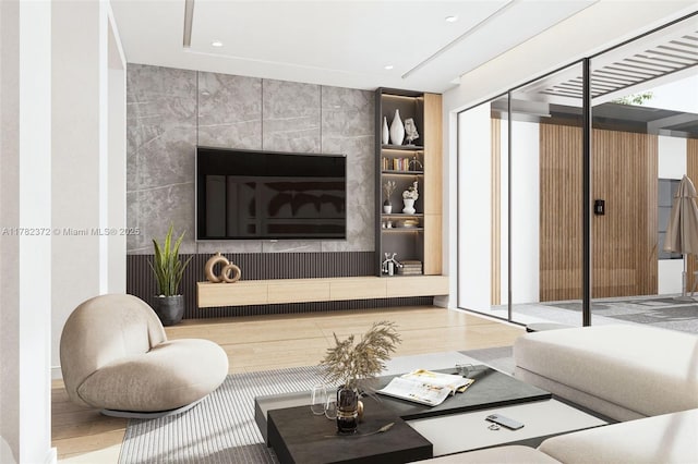 living room with wood finished floors and built in features
