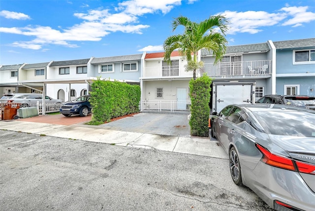 1845 W 73rd Pl Unit 1845, Hialeah, FL 33014 - townhome / multi-family property featuring a residential view and stucco siding