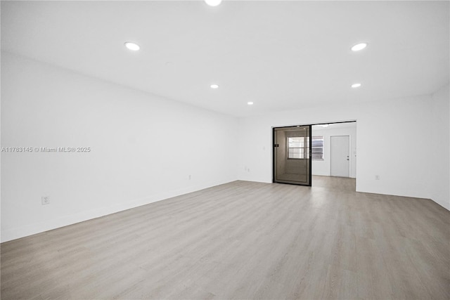1845 W 73rd Pl Unit 1845, Hialeah, FL 33014 - spare room with recessed lighting and light wood-style flooring