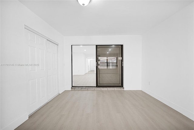 1845 W 73rd Pl Unit 1845, Hialeah, FL 33014 - unfurnished room with wood finished floors and baseboards