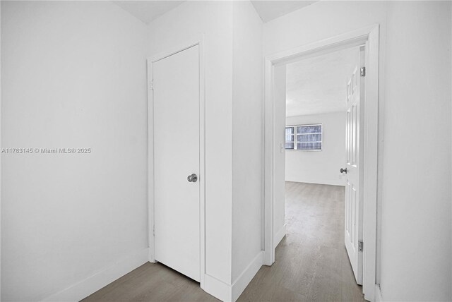 1845 W 73rd Pl Unit 1845, Hialeah, FL 33014 - hallway with wood finished floors