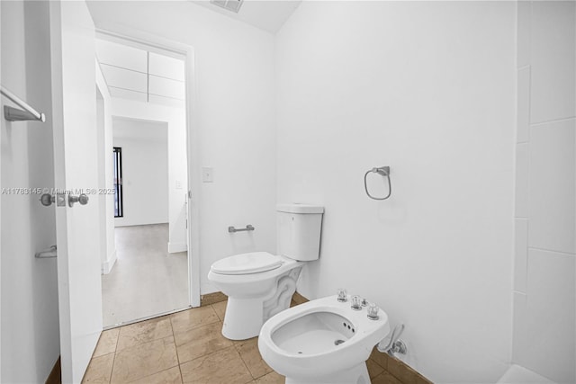 1845 W 73rd Pl Unit 1845, Hialeah, FL 33014 - bathroom featuring a bidet and toilet