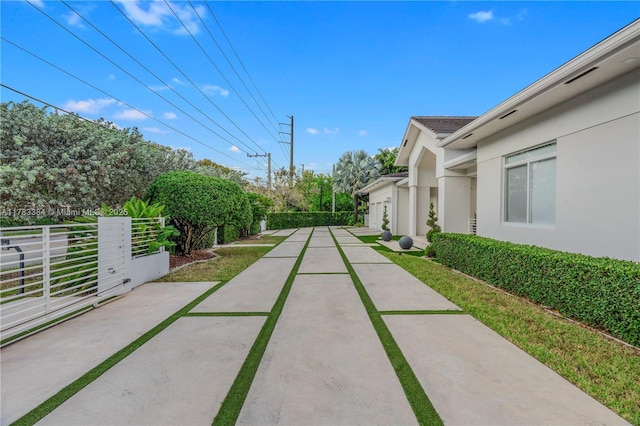 exterior space with concrete driveway