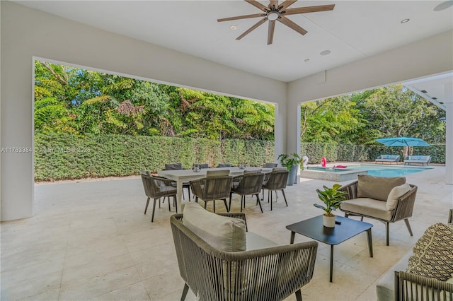 view of patio with outdoor dining space, a fenced in pool, an outdoor living space, a fenced backyard, and ceiling fan
