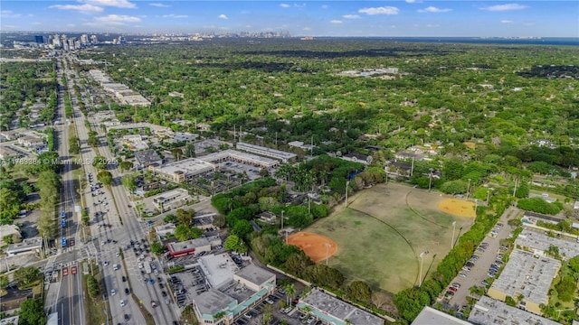 birds eye view of property featuring a city view