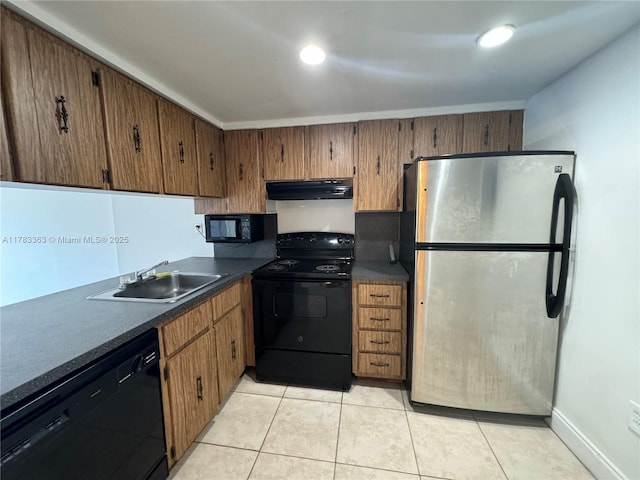 16465 NE 22nd Ave Unit 205, North Miami Beach, FL 33160 - kitchen featuring light tile patterned floors, exhaust hood, black appliances, dark countertops, and a sink