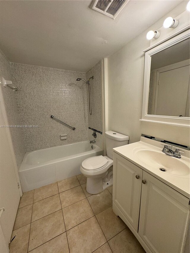 16465 NE 22nd Ave Unit 205, North Miami Beach, FL 33160 - full bathroom featuring toilet, vanity, shower / bathing tub combination, and tile patterned flooring