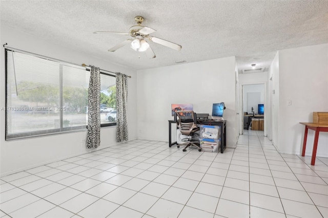 office area featuring a textured ceiling and ceiling fan