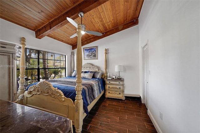 bedroom featuring baseboards, lofted ceiling with beams, ceiling fan, wood ceiling, and wood finish floors