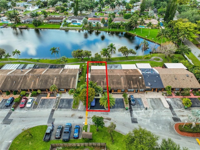 bird's eye view with a water view