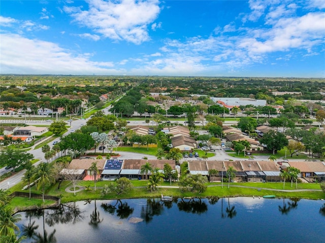 bird's eye view with a water view and a residential view