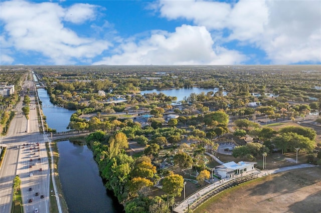 birds eye view of property with a water view and a residential view