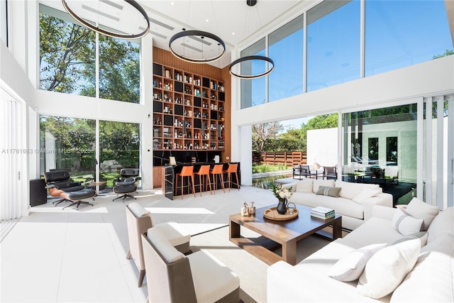 6295 SW 126th St, Pinecrest, FL 33156 - tiled living area featuring a high ceiling