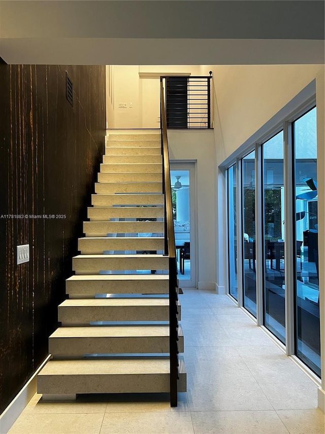 6295 SW 126th St, Pinecrest, FL 33156 - staircase with baseboards