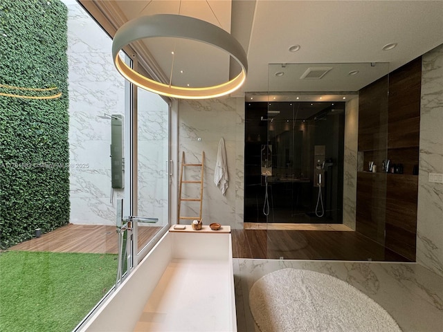 6295 SW 126th St, Pinecrest, FL 33156 - full bathroom with stone wall, a shower with shower door, and marble tiled flooring