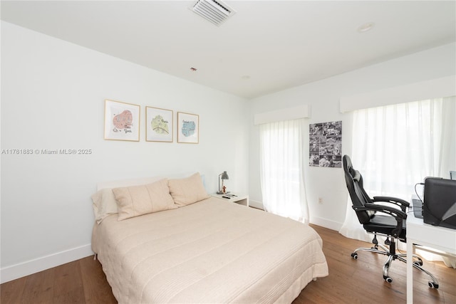 6295 SW 126th St, Pinecrest, FL 33156 - bedroom with baseboards, wood finished floors, and an office area