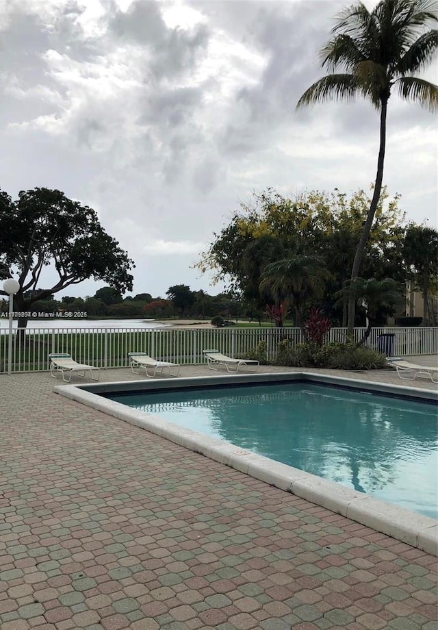 15300 SW 106th Ter Unit 534, Miami, FL 33196 - community pool featuring a patio area and fence
