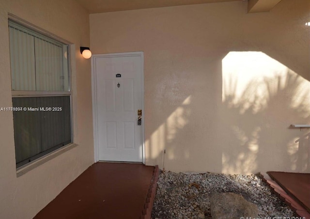 15300 SW 106th Ter Unit 534, Miami, FL 33196 - view of exterior entry featuring stucco siding