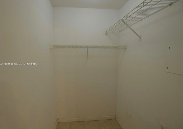 15300 SW 106th Ter Unit 534, Miami, FL 33196 - walk in closet with light tile patterned floors
