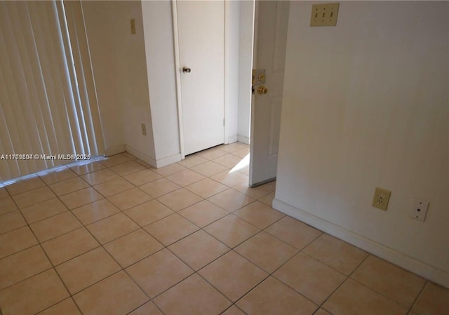 15300 SW 106th Ter Unit 534, Miami, FL 33196 - spare room with baseboards and light tile patterned flooring