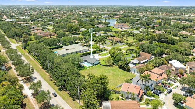 birds eye view of property with a residential view