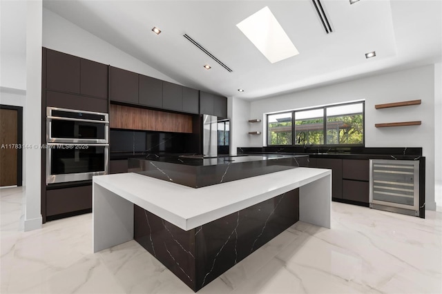 kitchen featuring wine cooler, a spacious island, modern cabinets, stainless steel double oven, and open shelves