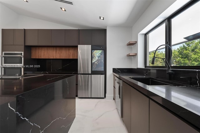 kitchen featuring a sink, stainless steel appliances, gray cabinets, tasteful backsplash, and marble finish floor