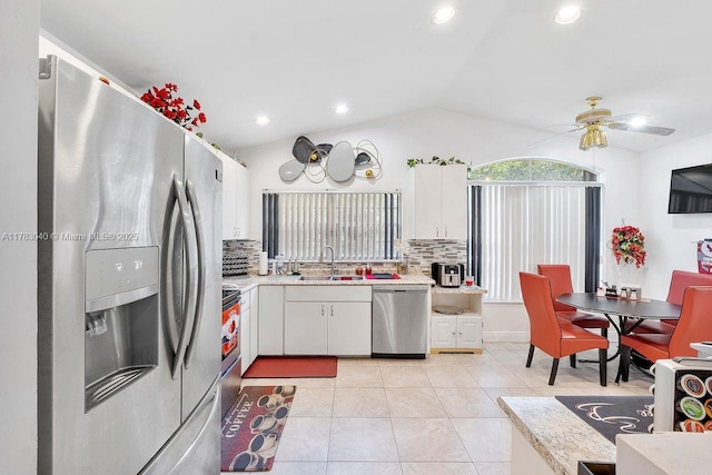 18201 SW 87th Ave, Palmetto Bay, FL 33157 - kitchen with appliances with stainless steel finishes, a sink, lofted ceiling, backsplash, and ceiling fan