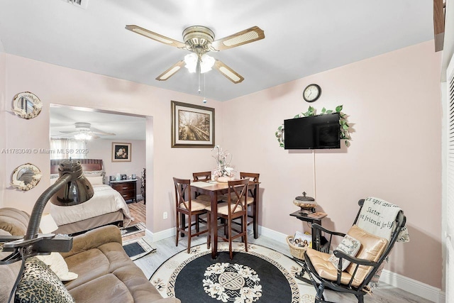 18201 SW 87th Ave, Palmetto Bay, FL 33157 - living room featuring a ceiling fan, wood finished floors, and baseboards