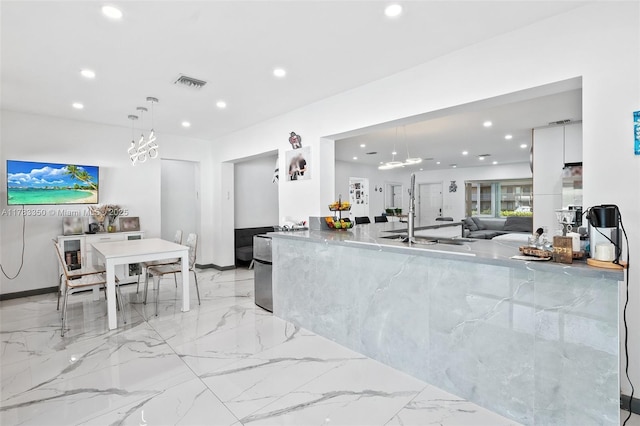 5117 Washington St, Hollywood, FL 33021 - kitchen featuring visible vents, recessed lighting, decorative light fixtures, and modern cabinets