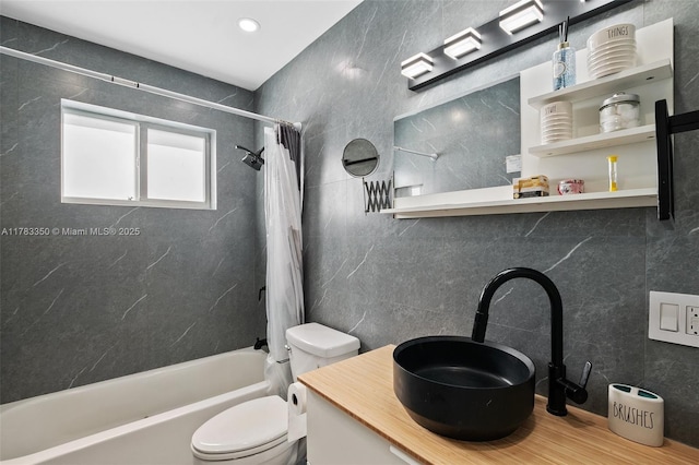 5117 Washington St, Hollywood, FL 33021 - bathroom featuring toilet, vanity, shower / tub combo with curtain, and tile walls
