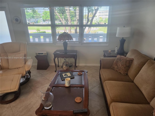 2114 E Cambridge E Unit 2114, Deerfield Beach, FL 33442 - tiled living room with baseboards and a healthy amount of sunlight